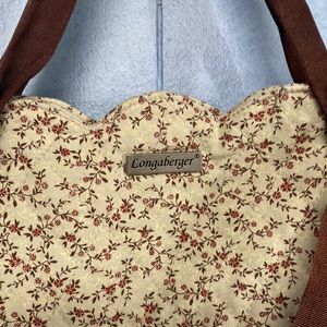 Longaberger fabric floral purse with silk ribbon straps.